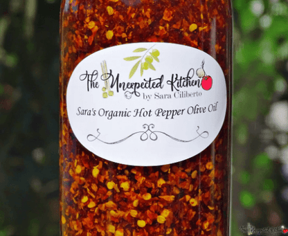 Close up of Sara's Organic Hot Pepper Olive Oil